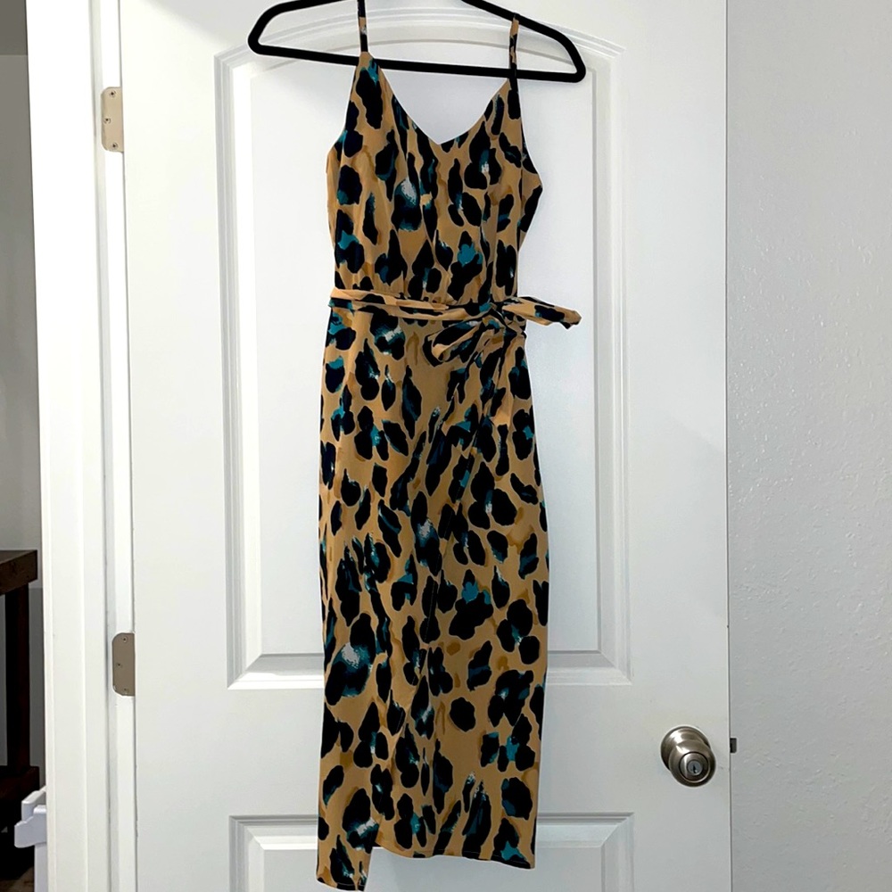 Midi dress size Medium. Front slit, animal print, adjustable straps. Worn once.